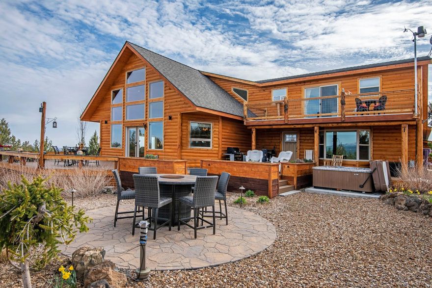 Jawdropping Cascade Mountain views of 9 peaks!  A modern home with huge windows and open floor plan on 13 plus acres.  Room to breathe and enjoy nature.  Located within the primary migration route for deer and elk, adjacent to public land, you can watch the wildlife throughout the year. You have everything you could possibly want in a 2016 custom-built home: a Great Room with a floor to ceiling stacked stone fireplace, beautiful vaulted ceiling and dining area just waiting to entertain all your friends and family.  State of the art radiant heated floors, a solar panel heats water & solar electricity can be sold back to the grid , Tesla back up batteries and an electric car charger. The well planned Gourmet Kitchen has a breakfast bar, top of the line appliances and an artistic SS backsplash.  Wake up to Cascade views from your bed and then step into the steam shower in an elegan elegant marble bathroom. Upstairs separate guest quarters await your company.