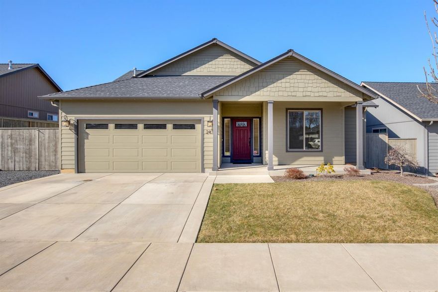 Beautiful, single level home in a great SW Medford location close to everything. Hardwood floors accent much of the primary living areas. Vaulted great room has a gas fireplace and incredible natural light. Open and inviting kitchen with granite countertops, stainless appliances and plentiful cabinet storage. Versatile floorplan features a master suite, complete with walk in closet, tiled bathroom and dual vanities. The additional bedrooms and full bathroom are located on the other side of the house for a nice separation of space. Easy care backyard with covered patio and fencing. Two car garage plus RV parking.