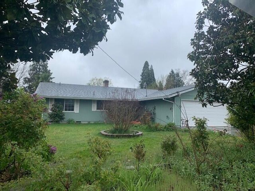 Lovely home in established neighborhood now searching for a new owner.  Nice split floor plan with 3 beds and 2 full baths, 1437 sf. The kitchen is nice sized with plenty of cabinets for storage. Dining room with a door to an enclosed patio. Large living area with a wood burning fireplace. Recent upgrades including fresh interior paint and flooring and baseboards in the bedrooms. and a brand new roof..This property has a huge lot of .31 with room for garden, boat or RV storage or just room for the kids to play.