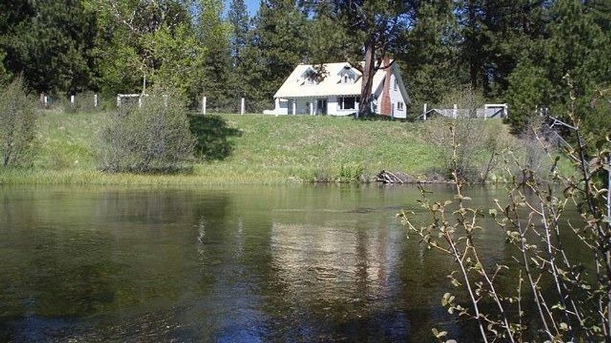 This classic spring creek fishery meanders nearly a mile through 212 acres. Crystal clear waters, cut banks, mossy logs and spawning gravels provide cover for the Brown and Redband trout from resident bald eagles. Riparian enhancement and protection is in place. Serene retreat for the discerning fly fisherman, waterfowl hunter and horseback riding enthusiast. This section of the Wood River contains the famous Caddis Hole as well as an estimated 95% of the spawning grounds for Agency Lake trout. Adjacent state forestry lands provide endless trails through forested ridges, home to elk, mule deer, bear and other wildlife. Lush, irrigated meadows find cattle grazing among numerous sculpted duck ponds. The classic two-story home with oversized garage and outbuildings is perched above the river and meadows. This picture postcard ranch profits from incredible Cascade Mountain views, including peaks of the Crater Lake Rim surrounded by Crater Lake National Park just 15 miles from the ranch.