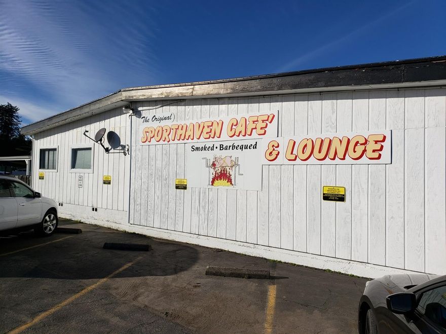 Own this business on the Port of  Brookings Harbor! This privately owned commercial property in Brookings, Oregon is a turnkey business opportunity and land. 6 retail spaces are all leased with agreements in place. An events, party and meeting room for rent. Called The Original Sportshaven today and is on nearly an acre with ample parking. This 9500+ sq ft nicely maintained building and occupants are a cash flow King! The Foggy Bottom is a complete lounge, full kitchen and bar with a stage for live music and dancing and Oregon Lottery. A brand new audio/video surveillance system. The Ocean Side Diner is an existing restaurant leasing from the owner as well as the stand alone Coffee House on the lot plus 3 other leased Business Tenants. Great cash flows!- call for private appointment. A 2016 Bank Appraisal shows $925k value.