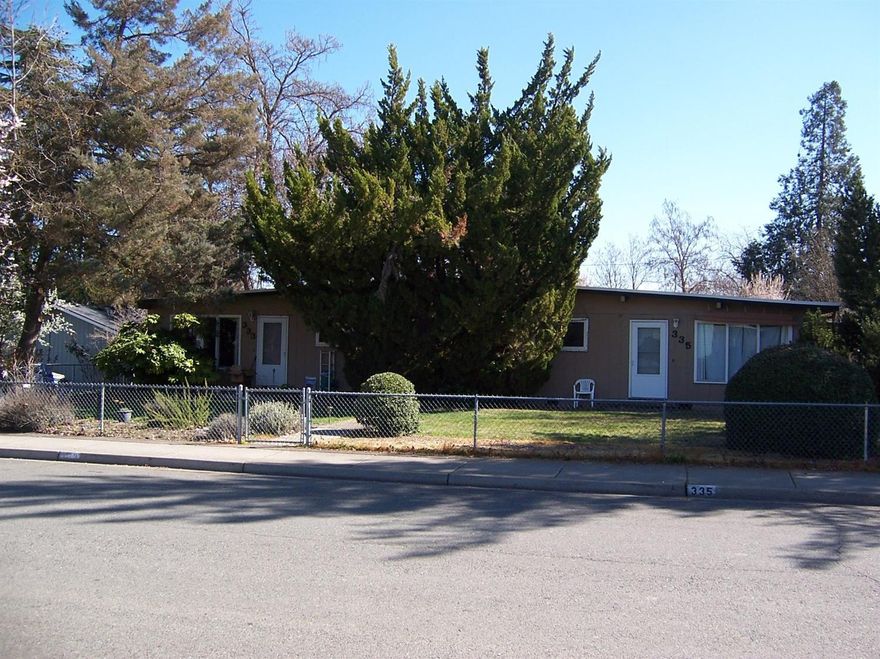 Great opportunity for Investors and/or Owner occupied Buyers. Nicely maintained Duplex in down town Medford. Both units are occupied and have been managed by the owner. Both of these units are approx. 1,024 sq.ft. each with huge living rooms, dining areas & massive bedrooms. #333 is a 2 bedroom/1.5 unit with 1-car detached garage. #335 is a 2 bedroom/1.0 bath units with a 1-car detached. Both units have very large bedrooms, vaulted T&G ceilings, lots of beautiful Hd-Wd floors & interior utility areas with W/D hook-ups. The oversize 2-Car garage is approx. 576 sq.ft. with an additional (16'x24') 384 sq.ft. shop area located at the rear of the garage. Both units have big front yards, large private rear yards with nice patios. This duplex is located on a large 0.23-acre corner lot with chain link fencing & mature trees. Both units have long term tenants and therefore the rents are well below market. Both units currently rented at $600.00/month. Water, sewer & trash included in the rent.