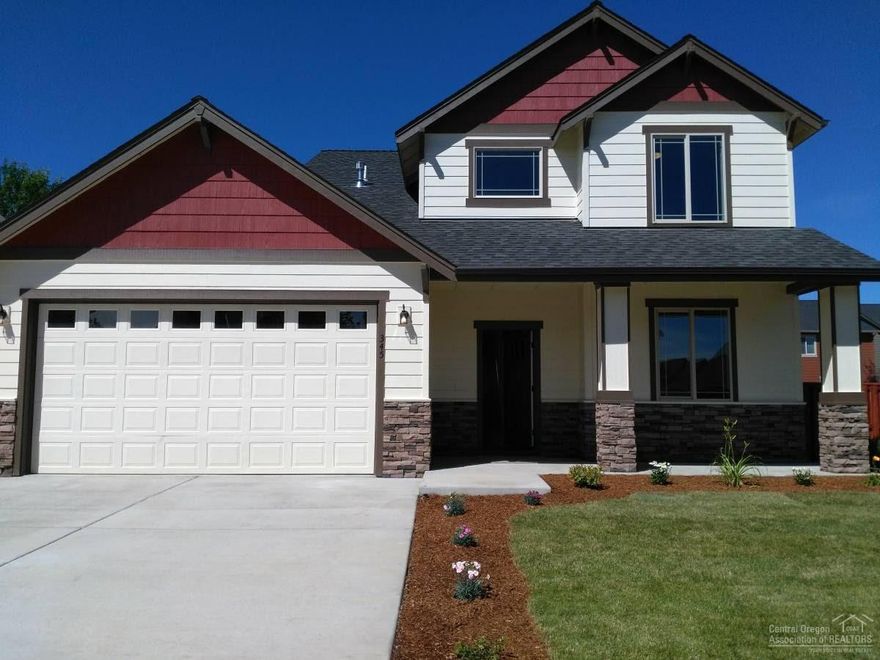 New, large home has a master on lower level along with a parlor. This great room concept boasts an island kitchen w/granite counter tops and a pantry, laminate flooring, mosaic tile backsplash, gas fireplace & ceiling fan. The upper level has 3 more bedrooms plus a huge loft/bonus room. You'll find RV parking for your toys, the lot is fenced & includes RV gates, landscaped in front and rear along with underground utilities. Columns in front and exterior rock accents.