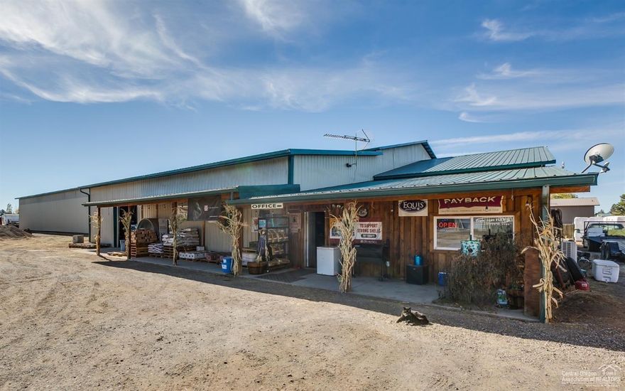 Great location! This is a profitable, established business and the owner is flexible on terms. Hwy. 97 frontage, condition use to sell hay, retail livestock feed and products & pet food. OR utilizing covered building for Hemp drying/processing. Commercial building, offices, several hay & storage buildings, 1363 sq. ft. manufactured home that is currently rented (or live in it and run the business), mountain views and much more. Owner will consider carrying a contract, trades, purchase & lease options, flexible terms.