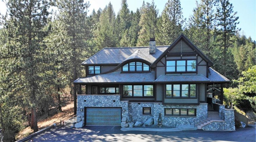 The finest craftmanship & attention to detail in this gated hilltop estate on 60 acres above the fog! Outstanding views of the Valley, City lights & mountain ranges including the rim of Crater Lake. The ultimate in privacy, peace & quiet! Trails & abundant wildlife meander thru the property. 100 yr fireproof slate roof, old growth redwood & mahogany cabinets, doors, trim & maple flooring. Triple & double pane windows, 2 high efficiency heat pumps & a Tulikivi soapstone wood stove that's the center piece of the family/dining room. Kitchen/w high end SS appliances, lrg island & tons of storage. Enjoy indoor/outdoor entertaining on the front porch or back patio each off the kitchen. A bonus 18x19 ft room for many uses from the current gym to a home theater, in law suite etc! A newly built cabin away from the home would make a wonderful artist retreat or ? Gravity fed fire sprinkler system on exterior & interior of the home & 2 fire hydrants. 30x60 insulted shop wired w/220.