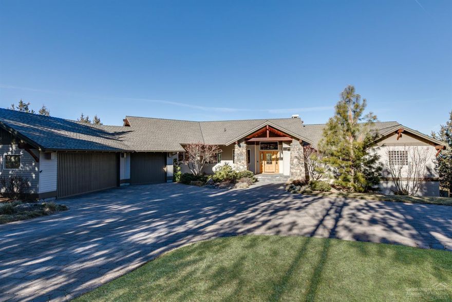 With a seven peak view (on a good day all the way to Mt Adams), flat driveway and backyard, beautiful construction and perfect layout, this may be your needle in the haystack that you have been looking for! Your first steps into the front door welcome you with a breathtaking view and warm inviting living/greatroom with fireplace, slab granite counter tops and open kitchen are an entertainers dream. The main floor has a spacious master suite, formal office, en-suite guest bedroom, living rm, dinning rm, killer deck to enjoy sunsets over all the mountains, kitchen breakfast/reading area with another fire place, powder bath and laundry/mudroom off the 3 bay garage with storage. Downstairs is light and bright with a bonus room that opens to the flat private backyard, two en-suite bedrooms and more storage. Don't miss this Awbrey Butte Gem!<br>