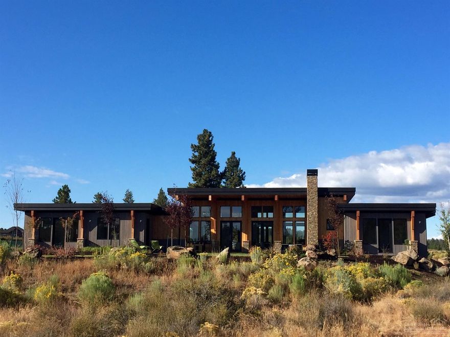 Stunning new construction in Tetherow located on a large corner lot backing to the 5th hole of Broken Top. NW contemporary exterior design features cedar siding & ceilings. Perfect single level w/ an open great room plan & lots of windows. Great separation between the 2 master suites; 2 additional bedrooms & office. Quality cabinetry & appliances, quartz counters, hardwood floors. Spacious 3-car garage. Cascade views from the sunny front patio. Private rear outdoor living features a built-in fireplace.