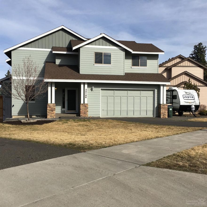 This Westside Riverstone home offers many EXTRAS at a great price. A great room floor plan, 4 bedrooms, 2.5 bathrooms PLUS a large office/den off the entry PLUS a roomy bonus loft. Enjoy the sounds of the Deschutes River & trails 3 blocks away yet close to Bend's downtown events and eateries. Parking for an RV or boat, oversize garage, spacious deck and fully fenced yard. Everything Bend out your front door. Immaculate and move in ready.