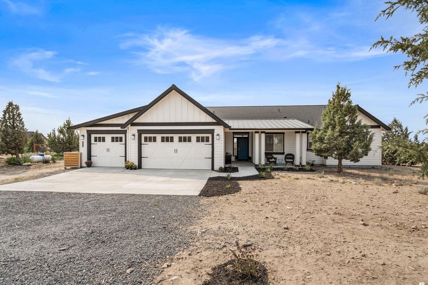 Located just 1/4 mile north of Brasada Ranch on the West side of Powell Butte, this 3 year old custom built home and hobby farm has a killer view of the Cascade Mountains!  A 36X36 pole barn with 2 stalls,  storage for the RV or farm equipment, chicken coop, a huge fenced garden with raised beds, additional animal pen and the property is fully fenced and gated. Shared well with neighbor for irrigation, Avion water to the home. Gorgeous ''cooks'' kitchen with double oven propane range, island with eating bar, walk-in pantry & designer features like two-tone cabinets, under-cabinet lighting, spice rack, and farm sink. Terrific Open floor plan with vaulted ceilings & large windows. Propane fireplace, built-in bookshelves/storage and Full Guest Suite. Primary has 2 sink vanity, soaking tub, private water closet, walk-in closet and access to back yard. Covered patio area plus large uncovered patio area, lawn, in-ground sprinklers and sooo much more! A must see!,
