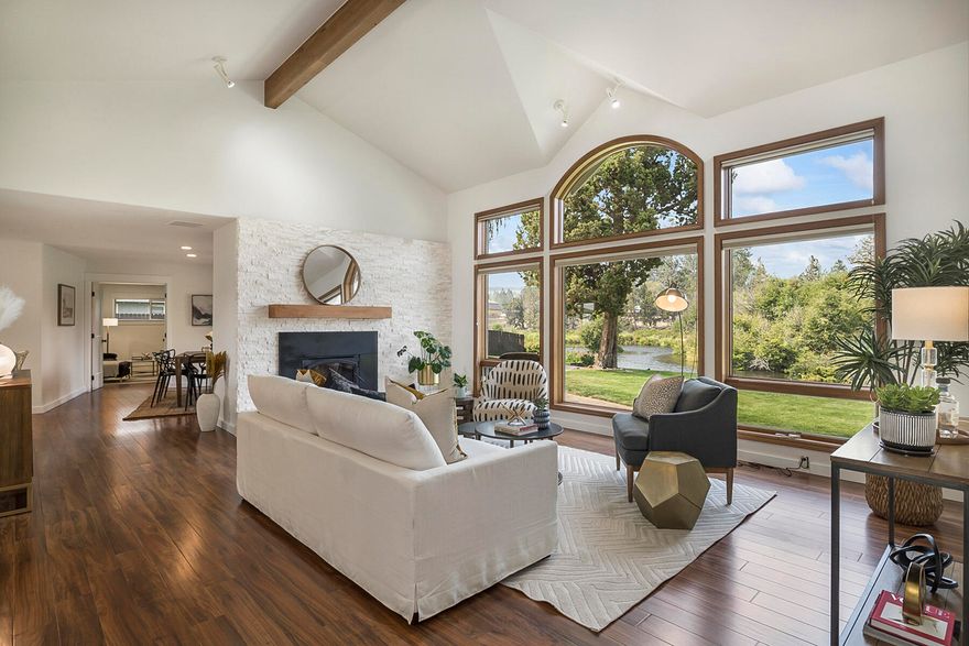 Do you dream of living, floating and fly fishing from your own backyard? 140 feet of low bank Deschutes River frontage in Tumalo. Thoughtfully remodeled home w/ privacy and direct river access in your backyard. Unobstructed river views of blue herring, otters, and deer.  River greets you as you enter the home w/ wall of windows & vaulted ceilings, stone fireplace & wood burning stove. Kitchen has high end soft close cabinetry, quartz counter tops & Kitchen-Aid stainless steel appliances. Breakfast bar overlooks the river to enjoy your morning coffee. 4 bedrooms & 3 full baths on 1 level. Large separate family/game room & private guest bedroom w/ its own entry & access to river. There is a 600 sq. ft. attached garage, separate heated storage/workshop & garden shed. Build a shop or barn on the front of the property, horses and animals are welcome. Room for entertaining & toys on 1.24 acres w/ irrigation straight from the river. Steps from downtown Tumalo & ''The Bite''.