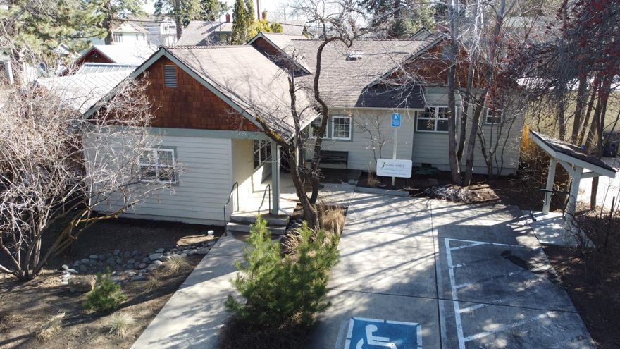 Located two blocks from the downtown core of Bend, Oregon, this 2,276 +/- square foot office building provides an excellent opportunity for a small company to acquire their own real estate.

Building  is in excellent condition ready for a law firm, accounting firm, financial advisory company, or clinical medical use.

• 100% remodeled in 2005
• 5 private offices and 1 conference room or additional large office able to accommodate 		up to 20 people
• Kitchen/Breakroom
• 2 bathrooms
• 7 dedicated parking stalls onsite
• Covered bike parking