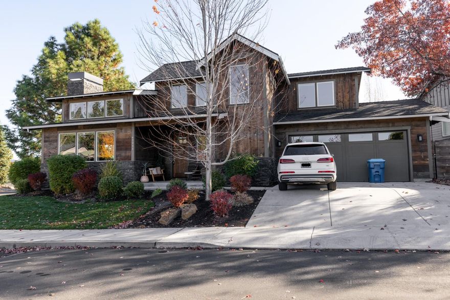 Welcome to your dream home on the desirable NW side of Bend, inspired by Brasada Ranch. This custom residence perfectly balances charm and modern elegance with its wood exterior, bright interior and upscale finishes. The open-concept layout flows seamlessly from the inviting great room with striking vaulted ceilings, featuring a beautiful stone gas fireplace, to the gourmet kitchen with quartz countertops. Enjoy a main level primary suite with two spacious bedrooms upstairs. The outdoor area is ideal for entertaining, boasting a covered patio, custom gas fire pit, and a fully fenced backyard. A Generac 24kW Guardian Generator is installed to automatically switch on when there is a power outage. No HOA fees provide additional freedom. Located close to trails, schools, shopping, and serene Riley Ranch Reserve, this home offers both comfort and convenience. Don't miss out on this incredible home!