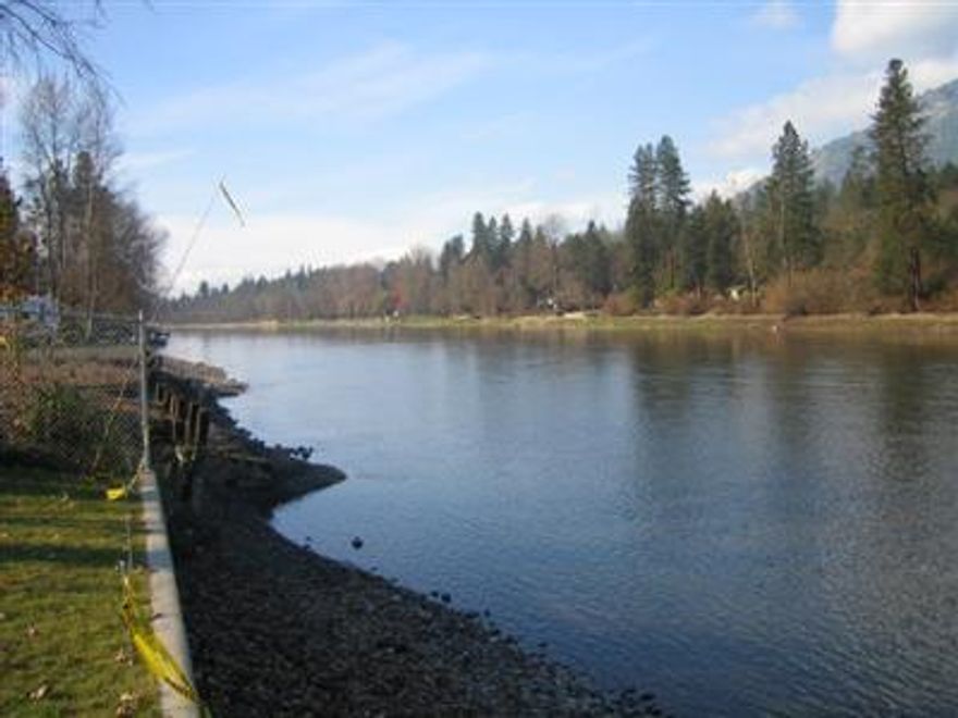 Recreation lot with well, shower, hot water heater and sink are in the well house. Chain link fenced and locked gate.