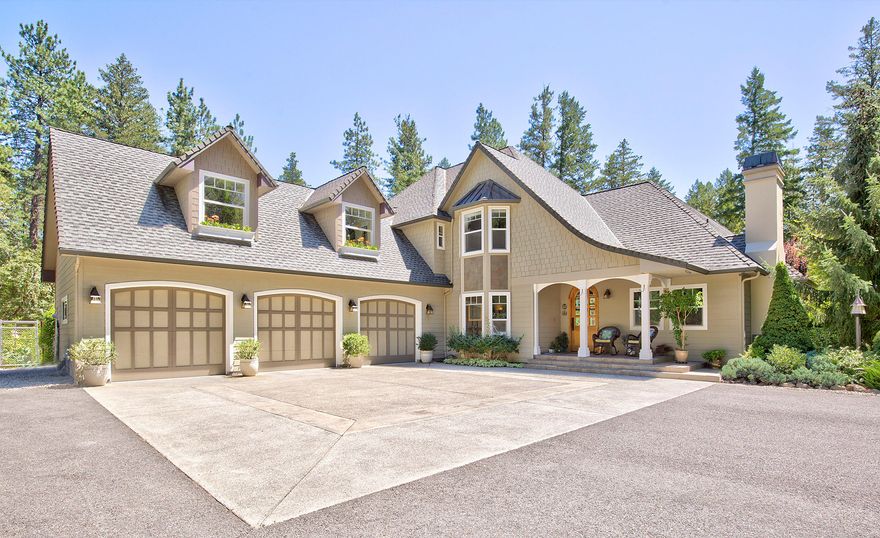 Christened ''Sherwood'' by her designer/builder, & crafted in the Cotswold style of England, this peaceful, private Oregon dream estate is considered to be one of the most well appointed & beautiful homes in Southern Oregon. Meticulous in every detail from the slate tile front porch through the grand arched walnut front door, to the exotic artisan crafted tile & wood inlay entry & rich cherry wood floors. Professional-designed, gourmet kitchen with generous walk-in pantry plus butler's pantry for all your entertaining desires. The interior wood trim & cathedral ceiling was harvested onsite & hand picked by the designer. The spacious main-floor master features a room-sized walk-in closet & spa bath. Enjoy lush garden landscaping from the balcony of one of 2 guest suites. 42x40 RV barn with full bath & full hookups, hobby room, exotic Ipa deck & private access to a massive trail system. A true work of art! Majestic country living just 8 minutes from town. Call for more today!