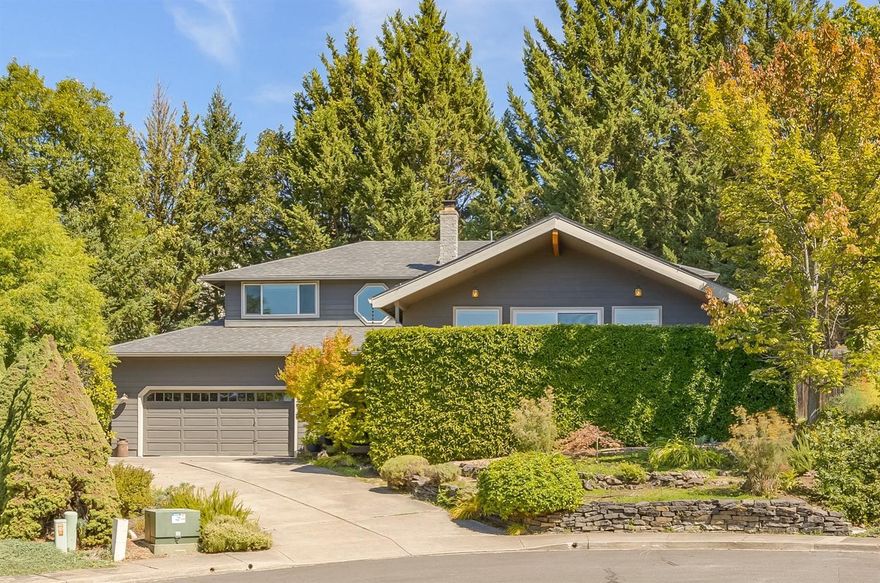 Quiet cul-de-sac living with views that stretch across the valley, provide one with stunning evening sunsets. This 3 bed 3 full bath is a split level home with ample room for a big family, in a layout that feels soft and comfortable. The home has been recently updated with a new roof, windows, exterior paint, interior paint, and carpet. The large lot provides room for the gardener and kids to play.