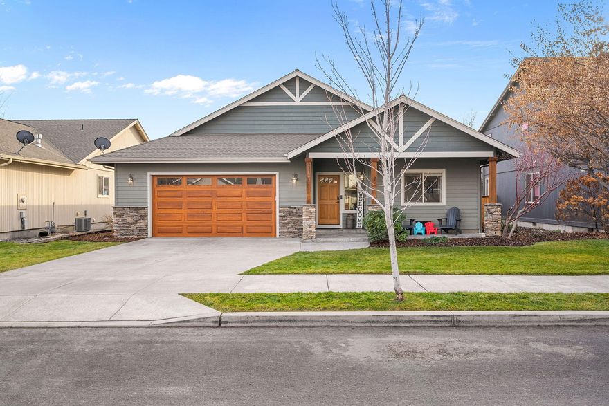 Beautifully updated & centrally located, this charming 3 bedroom, 2 bath home offers comfort, convenience, & a bright, welcoming atmosphere. Nestled on a quiet street just minutes from the new Redmond Recreation Center, you'll enjoy quick access to grocery stores, restaurants, & schools. Step inside to an open, light filled floor plan featuring new LVP flooring, fresh interior paint, updated trim, & a beautiful new wood front door. The vaulted ceilings & gas fireplace in the living room create an inviting space perfect for everyday living or entertaining. The spacious primary suite offers separation from the additional bedrooms & includes a walk-in closet and a refreshed bathroom with new tile flooring. With 1,668 sq ft of well designed living space, this home provides both comfort & functionality. Move-in ready & perfectly situated, this is a fantastic opportunity to own a thoughtfully updated home in the heart of Redmond.