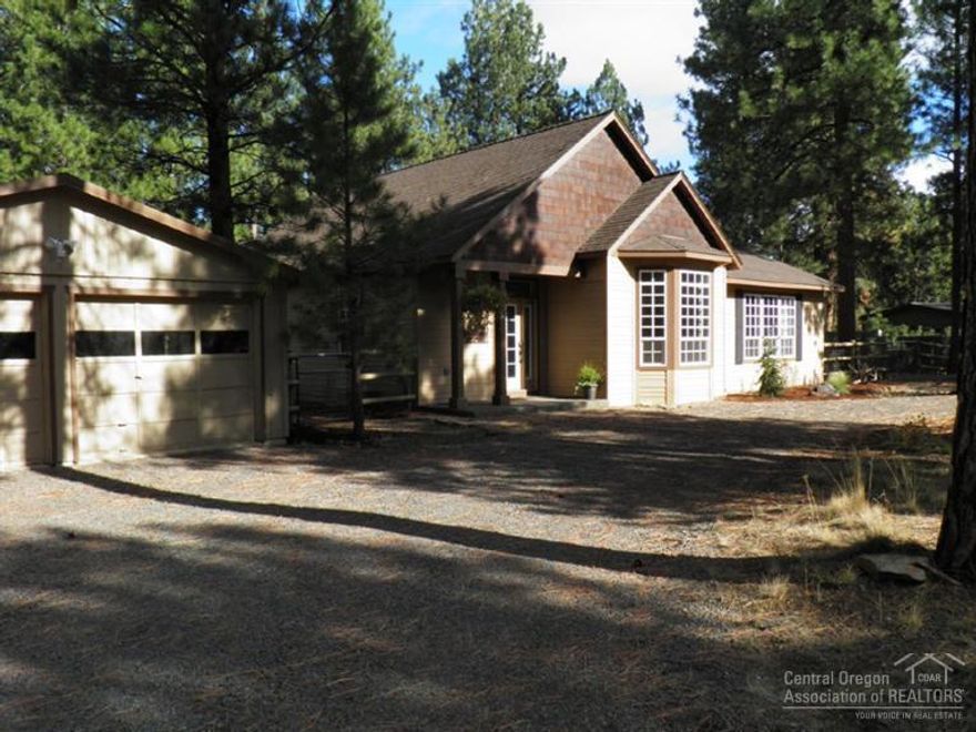 Newer single level home located in Crossroads neighborhood just minutes from the town of Sisters. Fenced for horses, run-in shelter w/hay storage & adjoins public land. Open the back gate and ride on out. Home features: tile, carpet, hardwood flooring, tile counters, hickory cabinets, propane gas fireplace and a great kitchen with eating bar. Large master bedroom and closet that adjoins laundry room for easy access. Truly a desirable & inviting floor plan. Sellers completed many upgrades & improvements.