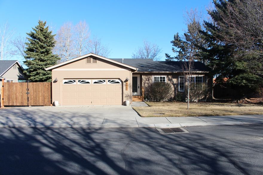 Welcome to this stunning single-level home in one of the area's most desirable communities surrounding a golf course! The neighborhood itself is very walkable and is near numerous walking trails as well. With its prime location, generous RV parking and recent upgrades including a new roof and furnace in 2022 as well as a new water heater and deck in 2023, this property truly has it all. Enjoy the comforts of single-story living, the freedom to park your RV or toys, and the peace of mind that comes with owning a beautifully maintained home in a fantastic neighborhood. Some of the exterior features include mature low-maintenance landscaping, a sprinkler system and water feature. Don't miss out on this incredible opportunity - make this house your dream home today!