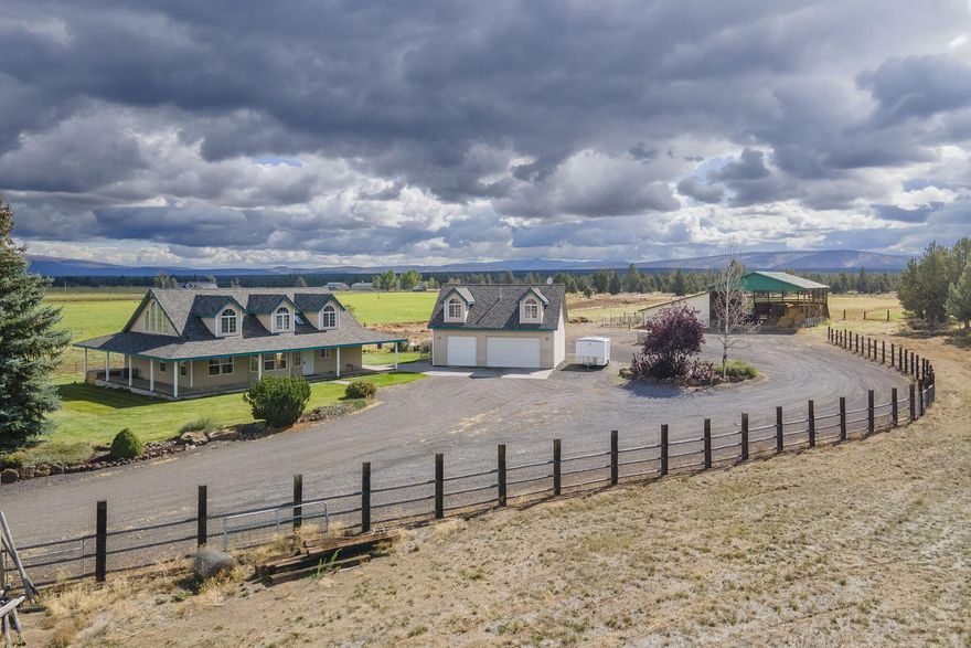Looking for a ranch/home where the elk roam, where you can grow your own hay, and have plenty of room for animals & hobbies? Then look no further, this beautiful updated ranch and home on 59.53 acres w/ 38.4 acres of irrigation rights has all of that and more. This peaceful property backs to BLM (Badlands) & has been well maintained & updated. A few of the updates include: new tile, new kitchen counters, all new appliances, new roof, & new HVAC. The detached garage includes a 1152 sqft, very well laid out living space. Fencing has been updated along with pivots, new pump and liner in irrigation pond. Property includes 7 horse stalls, 3 RV sites, hay barn & tack room. Unique is the best way to describe this property and it is a must see! Please see attached documents with all updates & property inclusions & exclusions. Including ADU, property is 4 bedrooms & 3.5 bathrooms. Deschutes Basin Water Rights dating back to 1900.