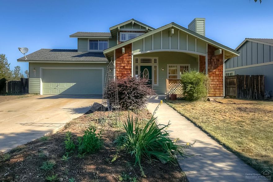 All NEW interior finishes & Move In Ready! Striking laminate floors & earth toned carpets, tile, upgraded finishes throughout. 3 bedrooms & 2.5 baths w/Powder room downstairs. Open living area w/Gas fireplace & plenty of wall space for your art. Formal Dining & Breakfast Nook, slider opens to back patio & there's a gate from the back yard to the PARK! Some views of Smith Rock & no neighbors behind you - private back yard. Quiet cul de sac location in family friendly neighborhood - this home needs you!