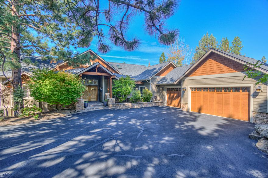 Stunning Awbrey Butte retreat with Cascade Mountain views! Offering both privacy and convenience, this home places you just minutes from Downtown Bend, NW Crossing, local markets, and favorite restaurants. The main level features a spacious primary suite, a dedicated office with built-ins, and a remarkable studio with vaulted ceilings, reclaimed wood beams, and a Montana moss rock wall. The open great room design connects the modern kitchen , dining, and living areas to a large deck with stone pillars overlooking the yard. The lower level boasts a media room with wine storage and wet bar, plus 3 bedrooms-two with ensuite baths-along with an additional full bath. Many updates with New carpet, New roof, Hot water heaters and HVAC system in the last 3 years, This home nestled on a quiet cul-de-sac, Come view this home that offers the perfect blend of tranquility, style, and Central Oregon living.