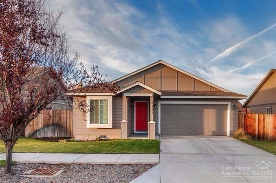 The perfect place to call home in a great west Redmond location! This adorable single level home is move-in ready and waiting for it's next owners. Open floor plan w/ vaulted ceiling, updated flooring, AC & security system. Large fenced yard w/ fire pit, sprinkler system PLUS raised garden beds w/ drip system! Spacious side yard with double gate, perfect for storying toys or RV (currently used as a large dog run). New exterior paint. Priced under $200K, this will go fast!