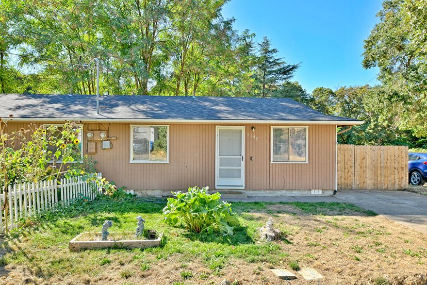 This charming 1,352 sq. ft. duplex offers a fantastic opportunity for both homeowners and investors!   One side features a long-term tenant providing steady rental income, while the other offers flexibility for an owner-occupant or additional rental potential. Each side offers 2 bedrooms, 1 full bathroom and 676 sq ft. New roof was installed last year! Oversized lot, offering room to add a garage or expand outdoor amenities. Buyer to check with City on usage.  Conveniently located near schools, shopping, and amenities, this duplex combines practicality with potential.