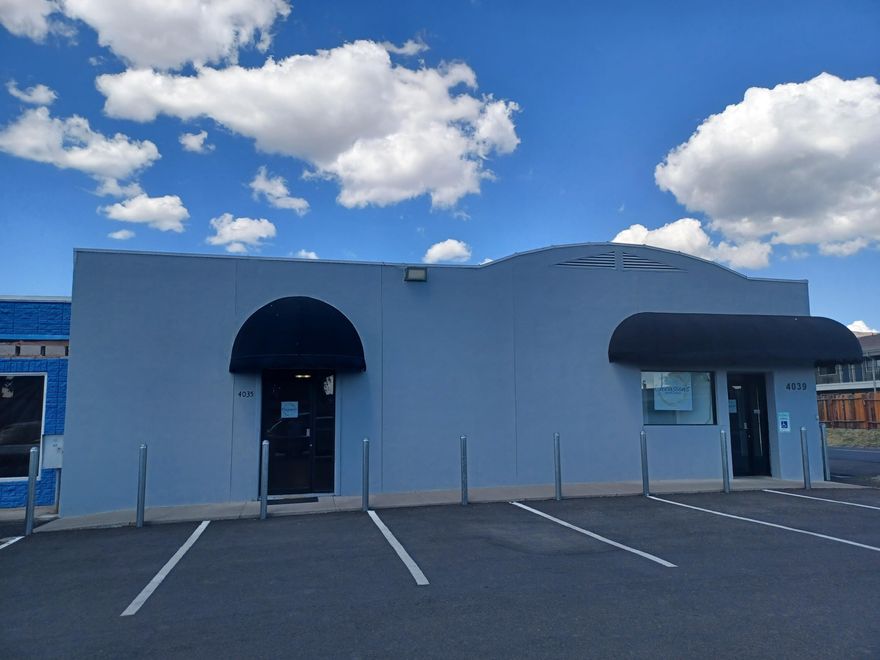 Immaculate 3,480 Sq. Ft. updated commercial building at the very desirable, high traffic So. 6ths St. location. Two large open areas as well as two smaller areas.  One bay door at the rear for street level loading.  Fenced yard with paved entrance at the rear.  Newer natural gas forced heat and air unit, on demand hot water.  Three immaculate bathroom areas. Newer Laminate Flooring in the main areas.  This could easily be divided into two units, your business on one side and rent out the other side. This is ''Turn Key and Ready to Go''.