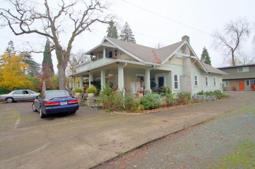 Perfect opportunity for an investor, this property is located in the historic Oakdale Avenue area. Featuring a 3 bed/2 bath two- story craftsman style house built in 1920, a two-story triplex built in 1971, with each unit having 2 bedrooms and 1 full bathroom, with a total of 4 units. The main house has central heat and air, a wood burning fireplace and a new roof installed 5 years ago. Each unit in the triplex has electric wall heaters downstairs, ceiling cable heat upstairs, and the roof replaced 10 years ago. All 4 units are currently being leased.