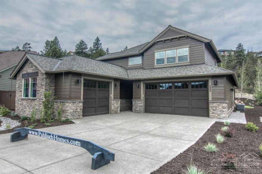 Pahlisch Homes new construction in a gated community, steps from the River Trail in River's Edge. Breathtaking, 2015 Tour of Homes feature (#35). Pahlisch custom quality finishes throughout include inviting entry into great room, coffered ceiling, large windows providing lots of light, quartz counter tops, SS appliances, engineered hardwoods, walk-in closet, and much more. Model home now open Thurs-Sun 12-4. Floorpan: HEMINGWAY 3-P-2746-2