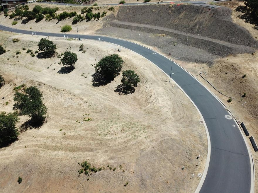 Time to buy this attractively priced, shovel ready View lot for sale in Medford's premier subdivision: Bella Vista Heights. Unlike most developments in East Medford, there is NO minimum building square footage requirement, all building designs to be approved by the Architectural Review Committee. Seller is offering courtesy to builders; multiple lot purchase discounts available. Call for details. HOA Dues $72.50/month/Per Lot 47