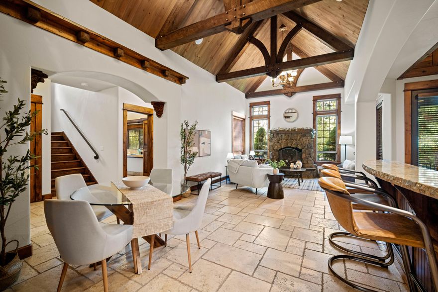 Tucked away in SW Bend, this beautiful, handcrafted home in the Cascadian style, is the perfect oasis to enjoy at the end of a busy day. High ceilings, open trusses, custom cabinets and finishes, and a Chef's Kitchen. The Primary Suite on the main level. The main level also boasts an office/study, which could also serve as an additional bedroom, a utility room, and a half bath. A covered patio spills out into a private back yard with a new hot tub. There is walk-in access to a large, conditioned space under the home perfect for workout area, wine storage, or hobbies. Upstairs are two large Guest Suites with spa-like baths. There is new carpet and LED lighting throughout. Homes in the Mountain River Estates neighborhood don't come to market often. With easy access to the Deschutes River Trail and a short drive to the Old Mill District and downtown, this neighborhood is the place to start living your Central Oregon life! Home is Staged, furniture will be removed at close of escrow.