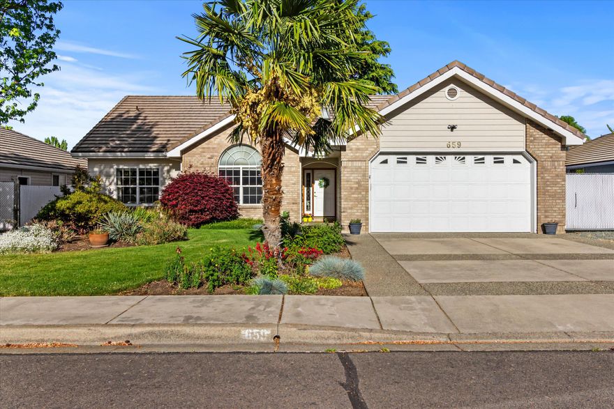 Welcome to 569 Jackson Creek Dr, a beautifully maintained single-level home in the heart of Central Point. This 3-bedroom, 2.5-bath residence offers an inviting and functional layout with a spacious living area, open dining space, and a well-appointed kitchen with ample cabinetry and counter space. The primary suite features a private bath and walk-in closet for your comfort. Step outside to an amazing enclosed patio—perfect for relaxing or entertaining year-round. The backyard is a peaceful retreat with mature landscaping, ideal for gardening, pets, or simply enjoying the outdoors. Additional highlights include an attached garage, separate laundry room, and a quiet, established neighborhood close to parks, schools, and shopping. Whether you're downsizing, buying your first home, or looking for single-level living, this move-in ready property is a rare find. Come experience comfort, convenience, and charm all in one place. Schedule your showing today!