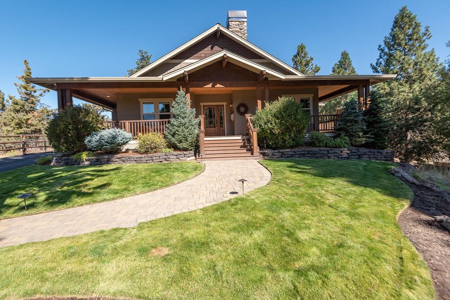 Beautiful custom home in NW Bend on almost 2 acres. Rare opportunity to live on small acreage with convenient access to Riley Reserve, the Deschutes River and only a 5 minute drive to downtown. This Northwest Style home boasts an open floor plan, great room featuring a gas fire place with stone surround and built-ins. Spacious kitchen with granite island, stainless appliances, custom cabinetry and large pantry. Primary suite on main level with tile walk-in shower, soaking tub and large walk-in closet. Two guest bedrooms, full bathroom, office, laundry room and half bath also on main level. Upper level showcases an expansive bonus room with kitchenette, full bathroom and a view of North Sister. Extensive outdoor living space with a covered wrap around deck and paver patio. Plenty of room for vehicles and toys with an attached 3-car garage and detached 1,494 SqFt RV garage with heat, storage and 50 amp RV hookup. Swalley canal runs through property and comes with one acre of irrigation.