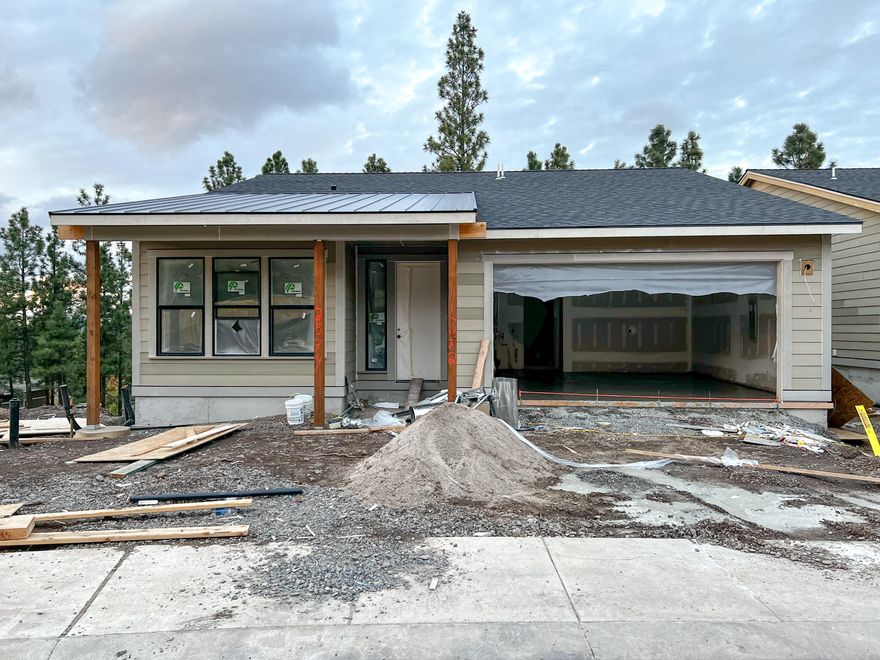 Situated on Bend's West side, Lot 2 in the new Marken Summit neighborhood is located near shopping, schools and restaurants. This Northwest Modern style home
features a creative selection of finishes and an efficient floor plan fit for any buyer. Enjoy the impressive primary suite featuring large walk in closet, tiled shower, and
double vanities. Also on the main level you will find another bedroom that will function well as an office. Downstairs are two bedrooms as well as a large bonus room and
full bath. The kitchen features custom cabinets, slab quartz countertops, and stainless steel appliances. 2 car garage. Earth Advantage Certified and built by Stone Bridge
Homes NW.