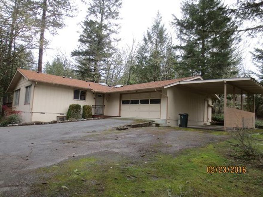 Beautiful Remodeled home on 1.83 acres. Features 2 bedrooms, 2 baths, approx. 1222 sf, hardwood floors in entry kitchen and dining area, living room with slate tiled fireplace, tile in master and guest bath, new remodeling in 2015 that included flooring, cabinets, kitchen, baths, and drywall. There's a deck, garage and 1 car carport. All on a wooded knoll. Hard to find this quality in this price range.