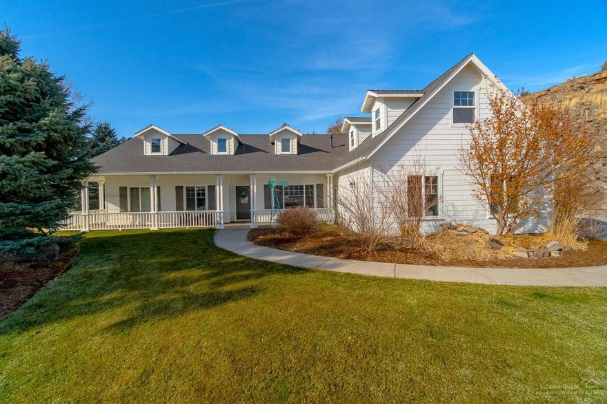 Nestled against the rimrock looking out to Monkey Face at Smith Rock State Park, this is a must see! Fresh updates inside & out w/modern farm house charm & timeless finishes. Covered front patio opens into a vaulted entry way w/formal sitting area/flex room. Great room layout w/new rustic LVP flooring, paint & trim. Shiplap & barnwood accents throughout. Kitchen offers slab Granite counters, crisp painted cabinetry, SS sink & appliances, bar seating. Real wood burning fireplace in living area for cozy winter mornings provides efficient heating in addition to the forced air furnace & heat pump. Desired Master separation w/barn door entry, new tiled shower, dbl sinks & soaking tub. The guest bath features a claw foot tub & step in shower too! Over the garage is a lg bonus room & storage closet that could easily accommodate a 3rd full bath.Triple car garage, storage shed/hay barn, chicken coop & fenced & cross fenced for critters. 4.14 acres of COI irrigation - perfect hobby farm!