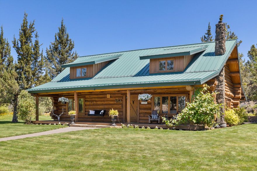 Introducing a special Bend lifestyle property that is nothing short of idyllic.  This unique hand-scribed log home tucked on a meticulously cared for Cascade view lot provides a perfect setting for those seeking privacy and tranquility with the luxury of city amenities nearby.  The property boasts a gentleman's horse set-up with corral and loafing shed, a detached garage and large storage shed.  The native natural setting is balanced with the softness of irrigated lush green lawn, a stocked pond and inviting outdoor living spaces which include a covered front porch and large private patio with a flowing water feature flanked by natural rock croppings. The home exudes character with beautifully hand-crafted vaulted ceilings, stone fireplace, wood windows, an updated kitchen and open staircase leading to the primary bedroom and lofted office space. The property is gated and has 2 acres of COI irrigation.  This is a rare gem that must be seen to appreciate the uniqueness of all it offers!