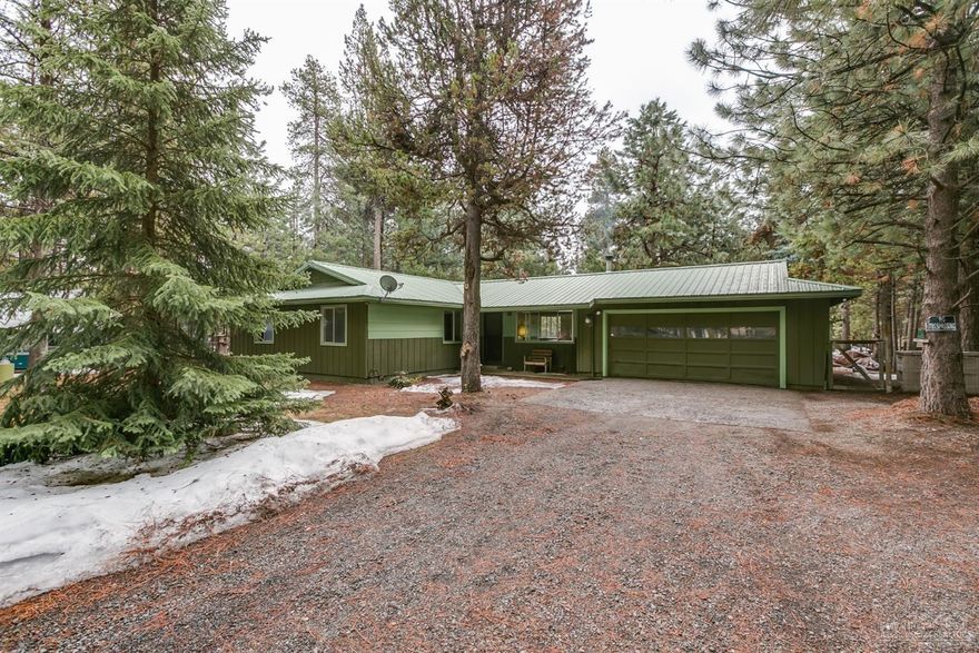 Sellers have updated this home to sell! All new laminate flooring and countertops, a fresh coat of interior paint, re-stained trim & spic-n-span, ready for new owners! One acre, fully fenced back yard with pull-thru driveway and shop/barn with RV covered storage either in or out. Fenced dog area, water feature, fire pit, screened porch/patio, wood-shed, certified wood stove, oversized attached garage with built-in storage and workbench! Ideal Retirement or first home, with room to stay and play in Central Oregon's outdoor mecca or just relax at home amongst the pines. Newish appliances, hot water heater, septic tank, woodstove. Need to see it to appreciate all this home has to offer!