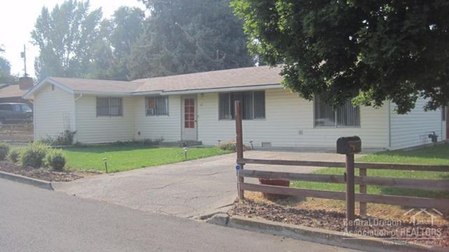 This ranch style home has 1446 SF, 3 bedrooms, 2 baths plus a large enclosed patio. Sits on a corner lot, has a nice sized storage building, landscaped and has an apple tree.