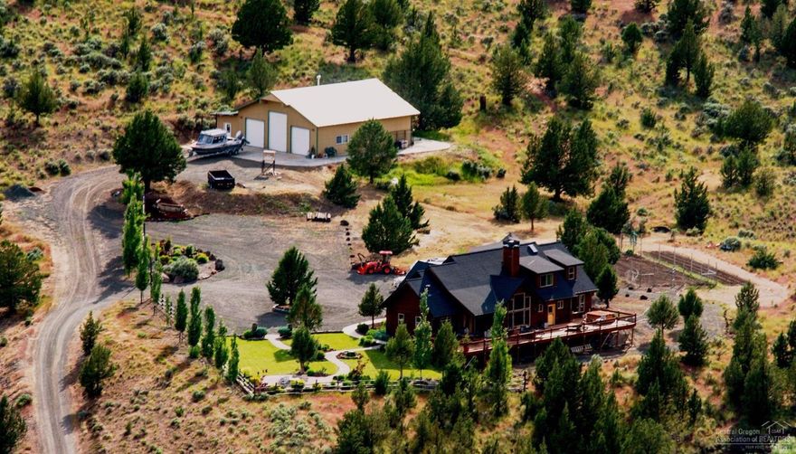 This ranch offers features to excite friends and family. The spectacular lodge-style home sits on a beautifully landscaped, elevated site over looking the John Day valley. The ranch is a sportsman's paradise with a variety of big and small game animals and birds. Watch Big Horn Sheep, Deer, Elk and Antelope as well as Wild Turkey, Pheasant and Chukers and fish the river for Trout and Steelhead. For the cattleman there are 20 acres of irrigated hayground and some 1640 acres of leased BLM rangeland.