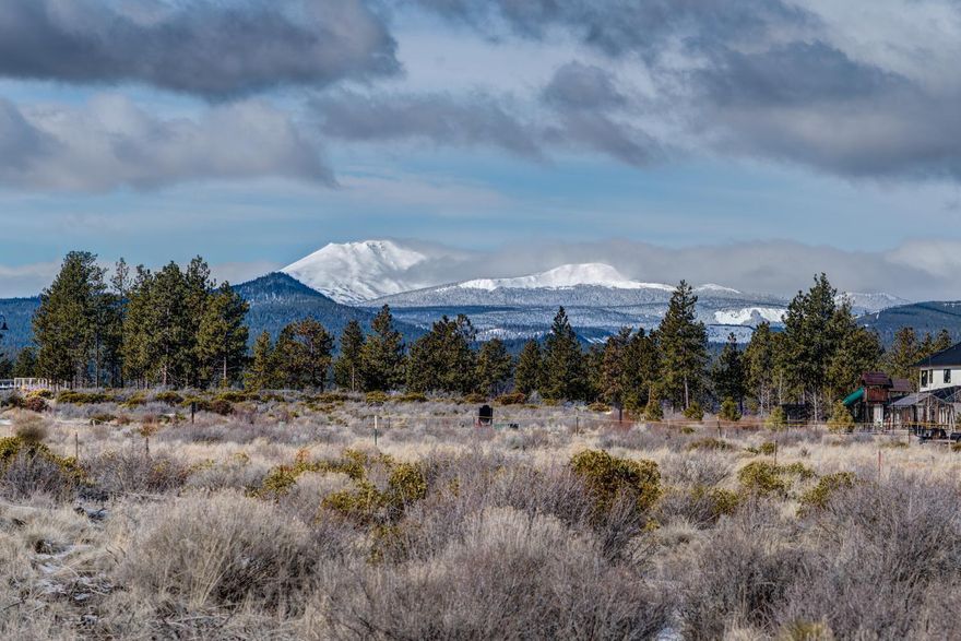 Rare opportunity to own a large 2.5 acre luxury homesite in Bend's premier subdivision, Westgate. Lot 58 is located on a secluded cul-de-sac and offers a nearly flat topography for an easy build, a number of mature and majestic ponderosas with spectacular mountain views. 1' water meter installed by the city that cost $20,000., house plans for 5184 sf plus 1018 sf garage and a TOPO survey has been done. Westgate is a coveted 85-lot development located adjacent to Shevlin Park with miles of hiking and biking trails. Only 3.5 miles to Downtown Bend and less than 25 miles to Mt Bachelor. Residents enjoy trails, access to parks, and within minutes can enjoy fly fishing, golf, hiking, cycling, farmers markets, restaurants & bakeries