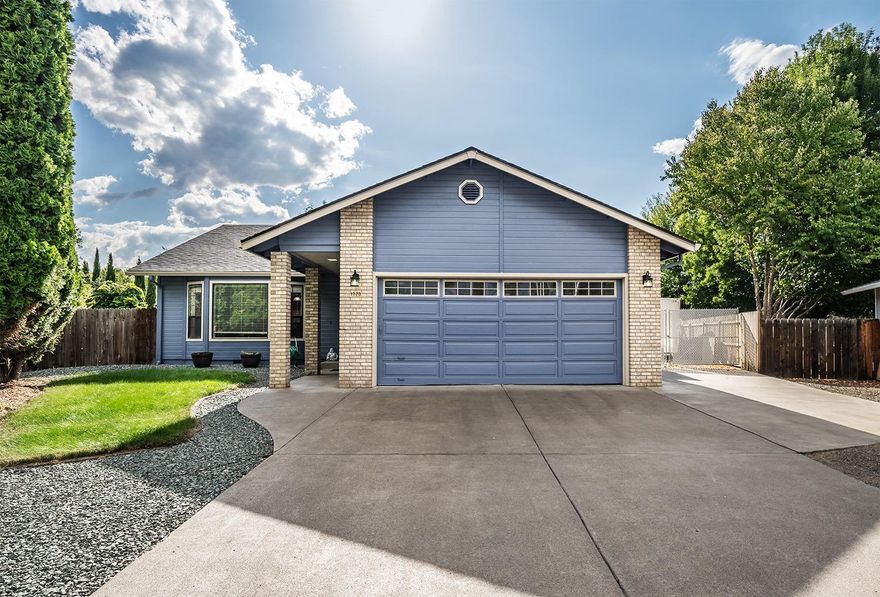 Lovely 3 bed/2 bath home at the end of a quiet, family-friendly cul-de-sac. Large front living room opens to dining area and kitchen. Brand new laminate flooring throughout main living areas and hallways, brand new exterior paint, newer HVAC system and condenser. Driveway has been freshly sealed and includes true RV parking! Large fully-fenced back yard, perfect for children and animals. Invite your friends over and spend time out back around the graveled fire pit area or enjoy the lush lawn which is kept green by the in-ground sprinkler system, perfect for entertaining. Home includes on-year Home Warranty!