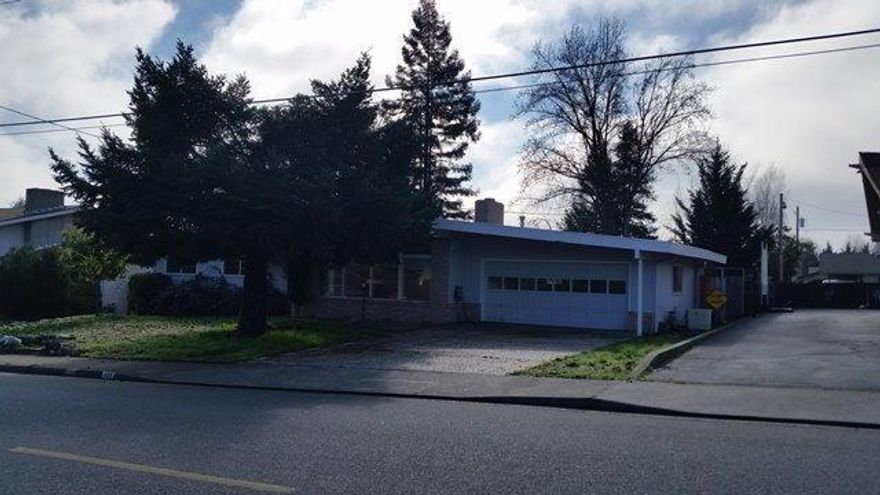 Sought after in town location! Home has had updates but was abused and needs some repair; carpets, paint and some carpentry but look at the price! City schools and close to everything. Attached 2 car garage plus a detached shop. Fenced yard. Come see!