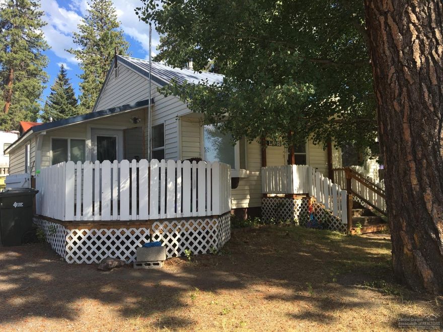 Charming 2 Bedroom 1 Bath Frame Home in Gilchrist Townsite. Home is very well maintained, with a Great Floor plan. Laundry Room with tons of storage space, Mud Room at side entrance, Upgraded Natural Gas Stove. Paved Driveway, Completely Fenced, Corner Lot, Insulated Garage Doors, Automatic Garage Door Opener.