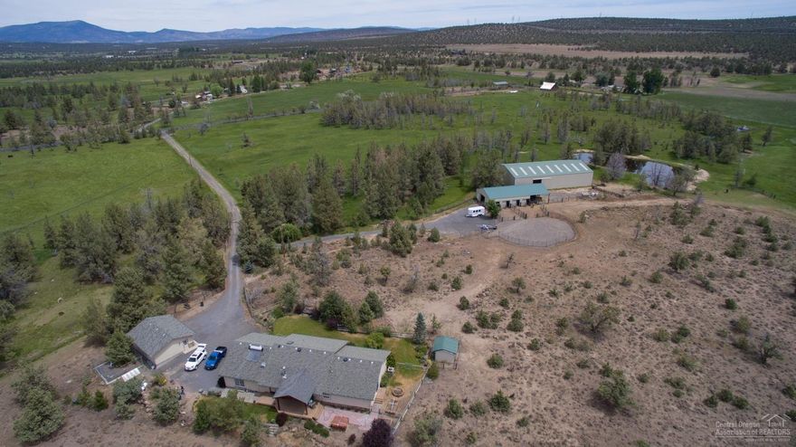 Owner will carry contract w/$750K down under agreed terms & conditions for 118+/-acre ranch with 111+/-irrigated acres in Powell Butte. Custom built 2650+/-single level home, barn, tackroom, in-door arena, hay storage, oversized 2 car garage & RV storage & shop. Open living, kitchen updated w/slab granite counters, skylight & hardwood floors, large utility rm w/bathroom/shower. Master bedroom has sliding glass doors to side yard & hot tub. Large covered deck to enjoy Cascade views. Solar powered front gate.