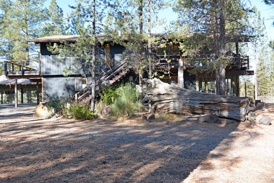 Just steps away from Fall River with Mt. Bachelor & Broken Top views this home sits on two acres (2 separate 1 acre lots. The included adjacent lot, 15172 is constructible) This 4 bedroom home features vinyl, carpet and wood laminate flooring, slab granite counter tops (kitchen & vanities), stainless kitchen appliances, a newer septic system, covered paver entry, mud room, vaulted great room with wood stove, family room with 2nd wood stove, multiple heat sources, covered decks, private covered hot tub, 2 year old roof and a detached 2 car garage/ shop with carport. RV parking and electrical hook ups. Fall River is known as a world class fly fishing river so make sure to bring your pole! Neighborhood access to BLM & US Forest Lands are just steps away as well. This home has had major updates, you must see to appreciate.