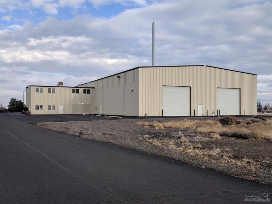 Industrial Building for Sale-$1,750,000 -200 feet of Highway Frontage -Located directly between Facebook & Apple Data Centers -Heavy Power -12 Reinforced Slab -4 Large Roll Up Doors -4.01 Acres -Additional 1.5 Acres Available -Cell Tower Income -Large asphalted parking lot-Currently operating as a bowling alley