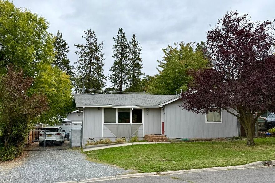 Charming 50's ranch with mature trees, a large lot and detached, oversized two car garage in an established Ashland neighborhood. Close proximity to city amenities, shopping and public transportation. Huge fenced back yard. Upgraded kitchen with center island and lots of room and light. Oversized detached garage is a major bonus with future potential to be converted into a detached ADU or studio. Buyer to verify with city. Ample parking on side yard.