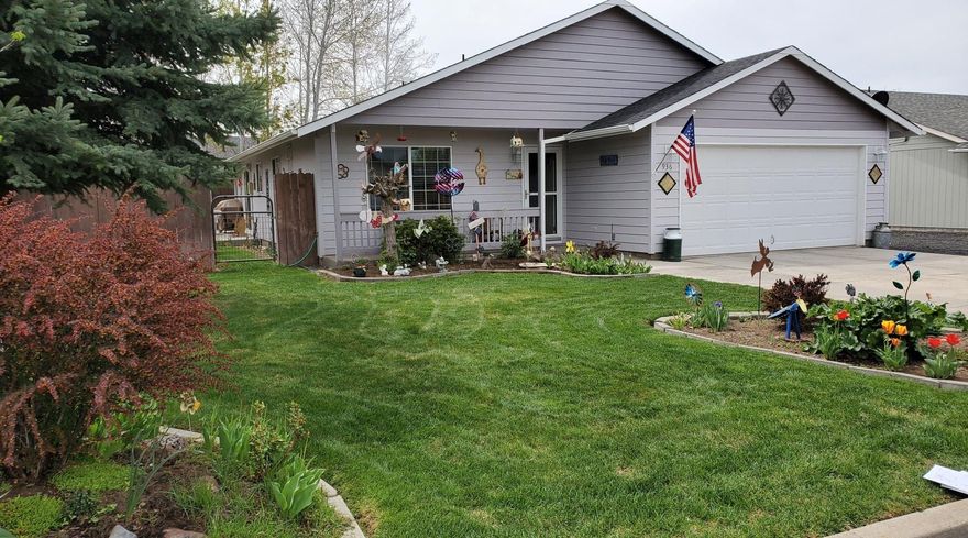 Beautifully landscaped and very well maintained 3 bed, 2 bath home located in North Ridge subdivision. 2 sliding glass doors to access cozy patio area. Wall air conditioner units in each room and lots of space for storage in double garage. Area on West side of home to park RV/Trailer or boat. Lots of flowers and mature trees. This is a well loved home and truly a little piece of heaven. Come take a look for yourself!